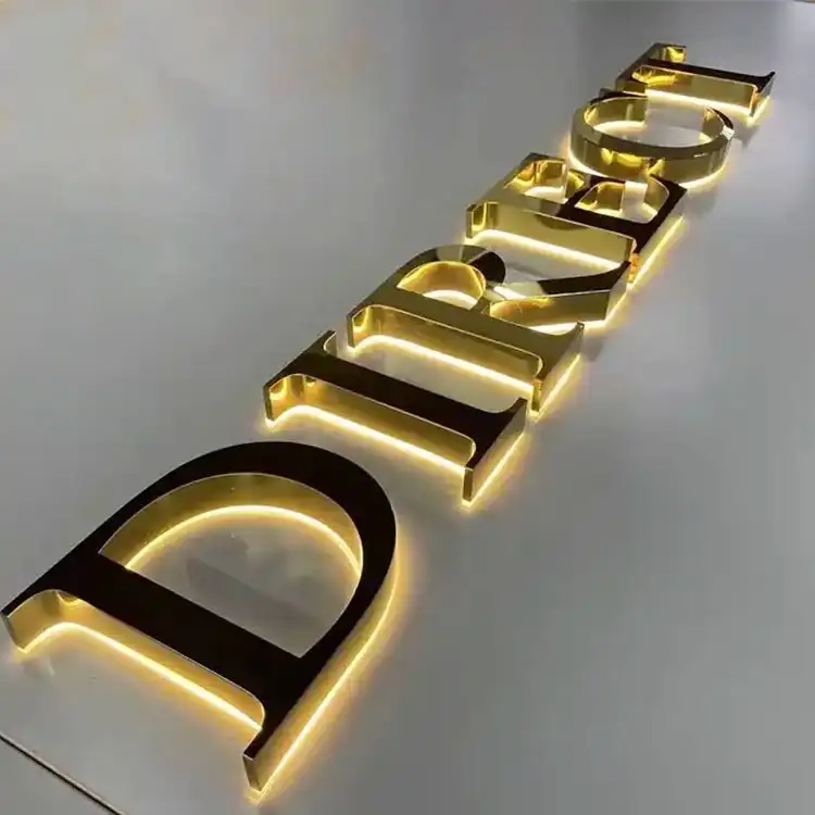 Gold letters with warm LED halo lighting